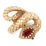 A GARNET SNAKE RING set with a pear cut almandine garnet and two round cut green garnet eyes, size E