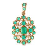 AN ANTIQUE EMERALD PENDANT in open scrolling design set with emerald and square cut emerald doublets