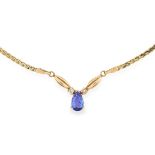 TANZANITE AND DIAMOND PENDANT NECKLACE set with a
