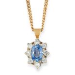 SAPPHIRE AND DIAMOND CLUSTER PENDANT set with an o