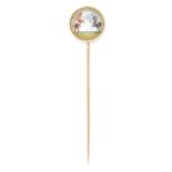 AN ANTIQUE ESSEX CRYSTAL POLO TIE PIN in yellow gold, set with a circular reverse carved intaglio,