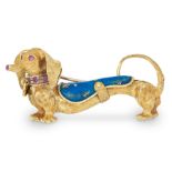 A RUBY AND ENAMEL DACHSHUND BROOCH designed as a sausage dog, with ruby nose, eyes and collar,