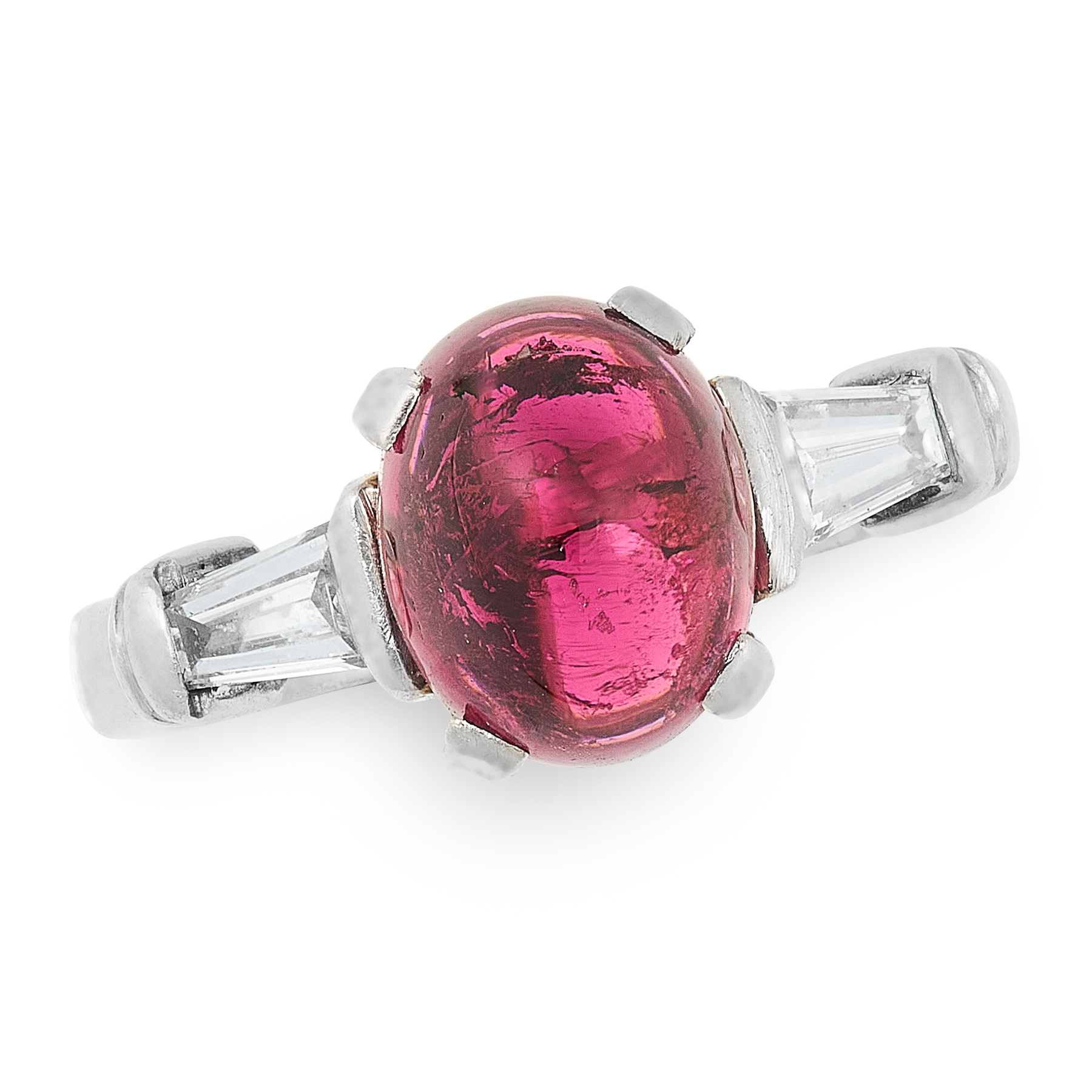 A RUBY AND DIAMOND RING in platinum, set with a sugarloaf cabochon ruby ...