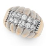 A DIAMOND DRESS RING, CIRCA 1945 in high carat yellow gold, of bombe design with reeded
