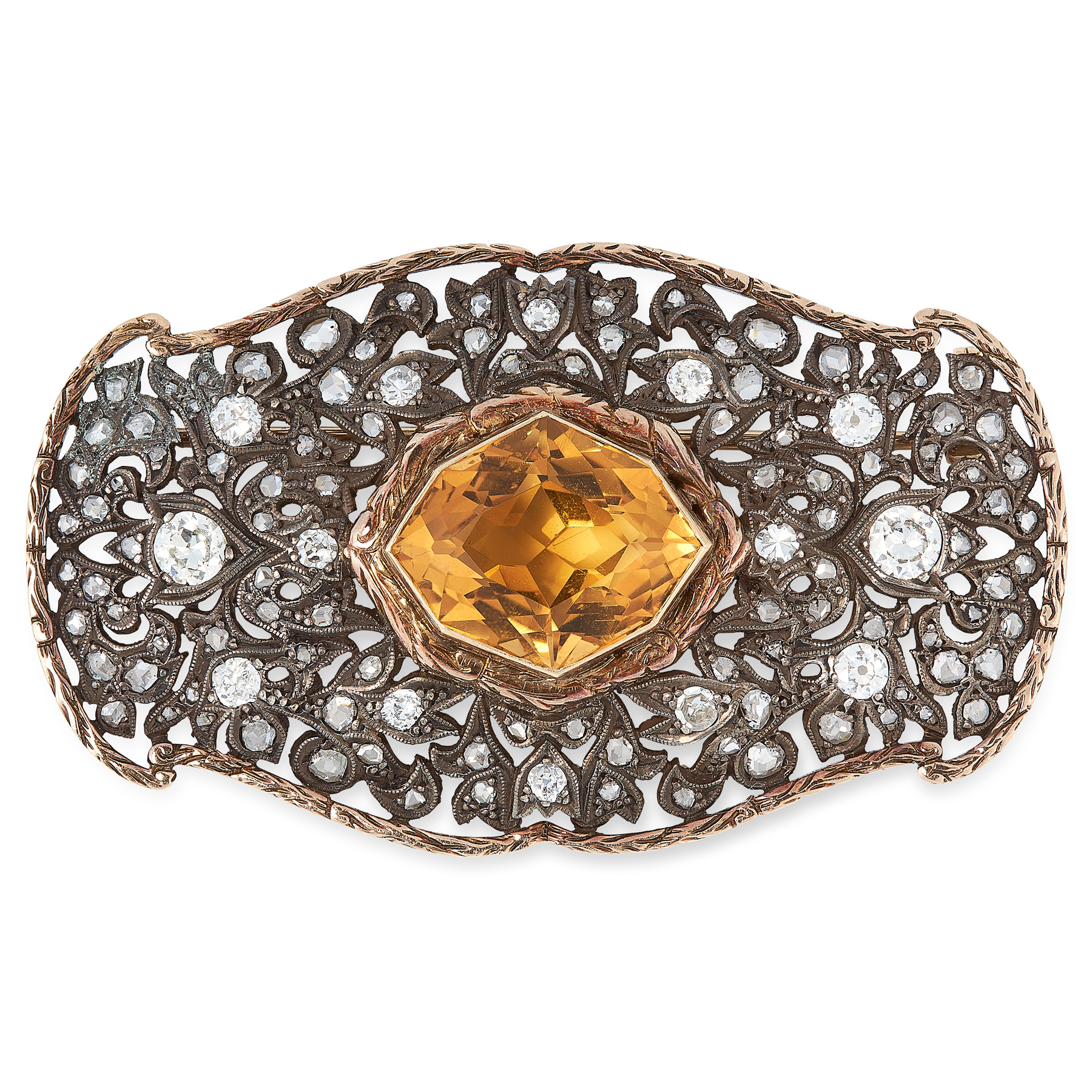 AN ANTIQUE CITRINE AND DIAMOND BROOCH in yellow gold and silver, set with a fancy cut citrine within