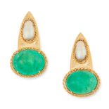 A PAIR OF EMERALD AND PEARL EARRINGS each set with an oval cabochon emerald below a baroque pearl,