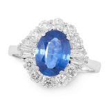 A SAPPHIRE AND DIAMOND CLUSTER RING set with an oval cut blue sapphire of 2.25 carats within a