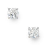 A PAIR OF 1.34 CARAT DIAMOND STUD EARRINGS, TIFFANY & CO in platinum, each set with a single round