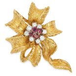 A RUBY AND DIAMOND RIBBON BROOCH, KUTCHINSKY, CIRCA 1960 set with a cluster of round cut rubies