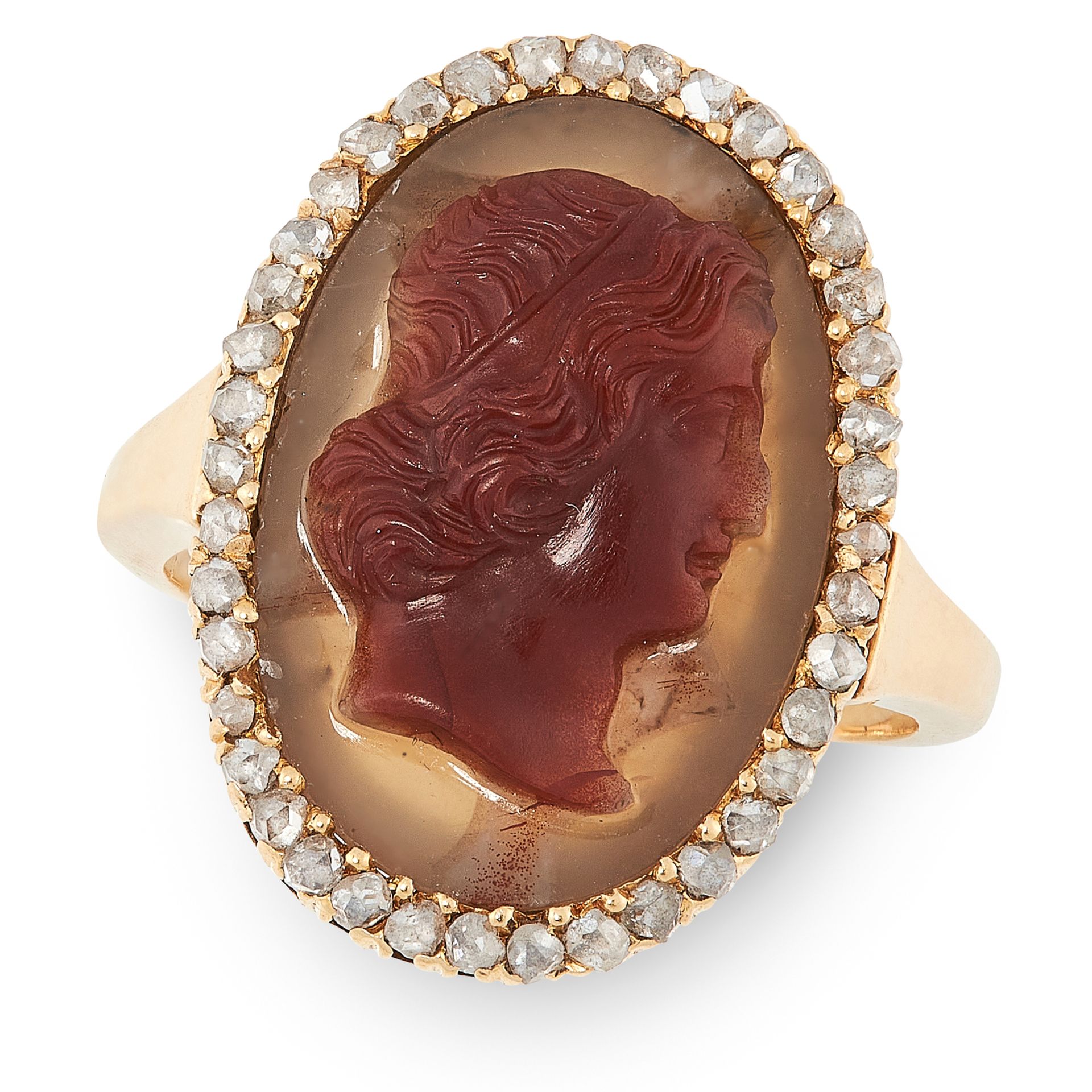 AN ANTIQUE CARVED AGATE INTAGLIO AND DIAMOND RING in yellow gold, set with an oval carved agate