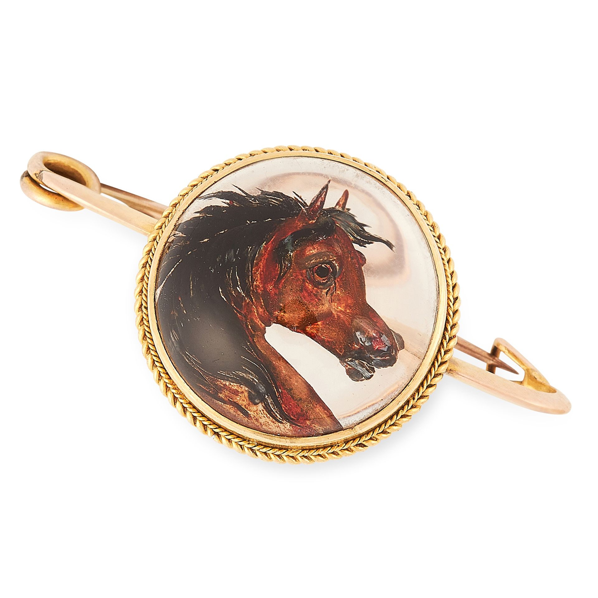 AN ANTIQUE REVERSE CARVED INTAGLIO HORSE BROOCH in yellow gold, set with a central Essex crystal