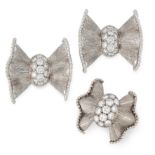 A DIAMOND BOW RING AND EARRINGS SUITE in 18ct white gold, each designed as a textured bow set at the