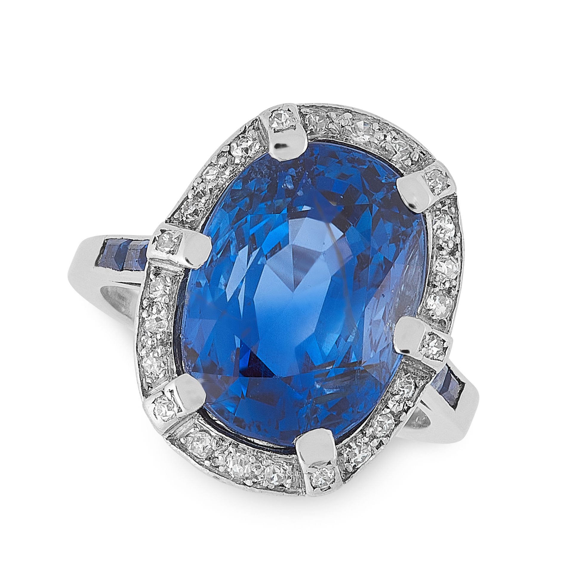 A BURMA NO HEAT SAPPHIRE AND DIAMOND RING in platinum, set with an oval cushion cut sapphire of