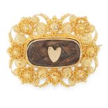 AN ANTIQUE HAIRWORK MOURNING BROOCH, 19TH CENTURY in 18ct yellow gold, the rounded rectangular