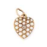 AN ANTIQUE PEARL AND DIAMOND HEART PENDANT / CHARM in 15ct yellow gold, designed as a heart, set