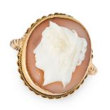 A CAMEO DRESS RING in yellow gold, set with an oval shell cameo carved in detail to depict the
