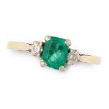 AN EMERALD AND DIAMOND RING in 18ct yellow gold and platinum, set with an emerald cut emerald