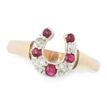 A RUBY AND DIAMOND DRESS RING in high carat yellow gold and platinum, designed as a horseshoe, set