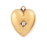 AN ANTIQUE DIAMOND HEART PENDANT / CHARM in 15ct yellow gold, in the form of a heart, set to the