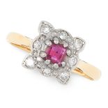 A RUBY AND DIAMOND DRESS RING, CIRCA 1940 in 18ct gold and platinum, set with a step cut ruby within