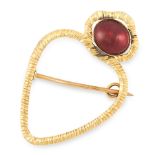 AN ANTIQUE GARNET HEART BROOCH in 18ct yellow gold, designed as a heart motif, with textured