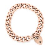 AN ANTIQUE SWEETHEART BRACELET in yellow gold, formed of a chunky curb link bracelet with a heart