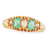 AN ANTIQUE EMERALD AND DIAMOND DRESS RING, 1901 in 18ct yellow gold, set with two emerald cut