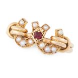 AN ANTIQUE VICTORIAN GARNET AND PEARL RING in 15ct yellow gold, designed as two interlinked