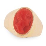 AN ANTIQUE CARVED CORAL CAMEO RING in high carat yellow gold, set with an oval carved coral cameo
