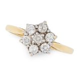 A DIAMOND CLUSTER RING in 18ct yellow gold and platinum, set with a cluster of seven round cut