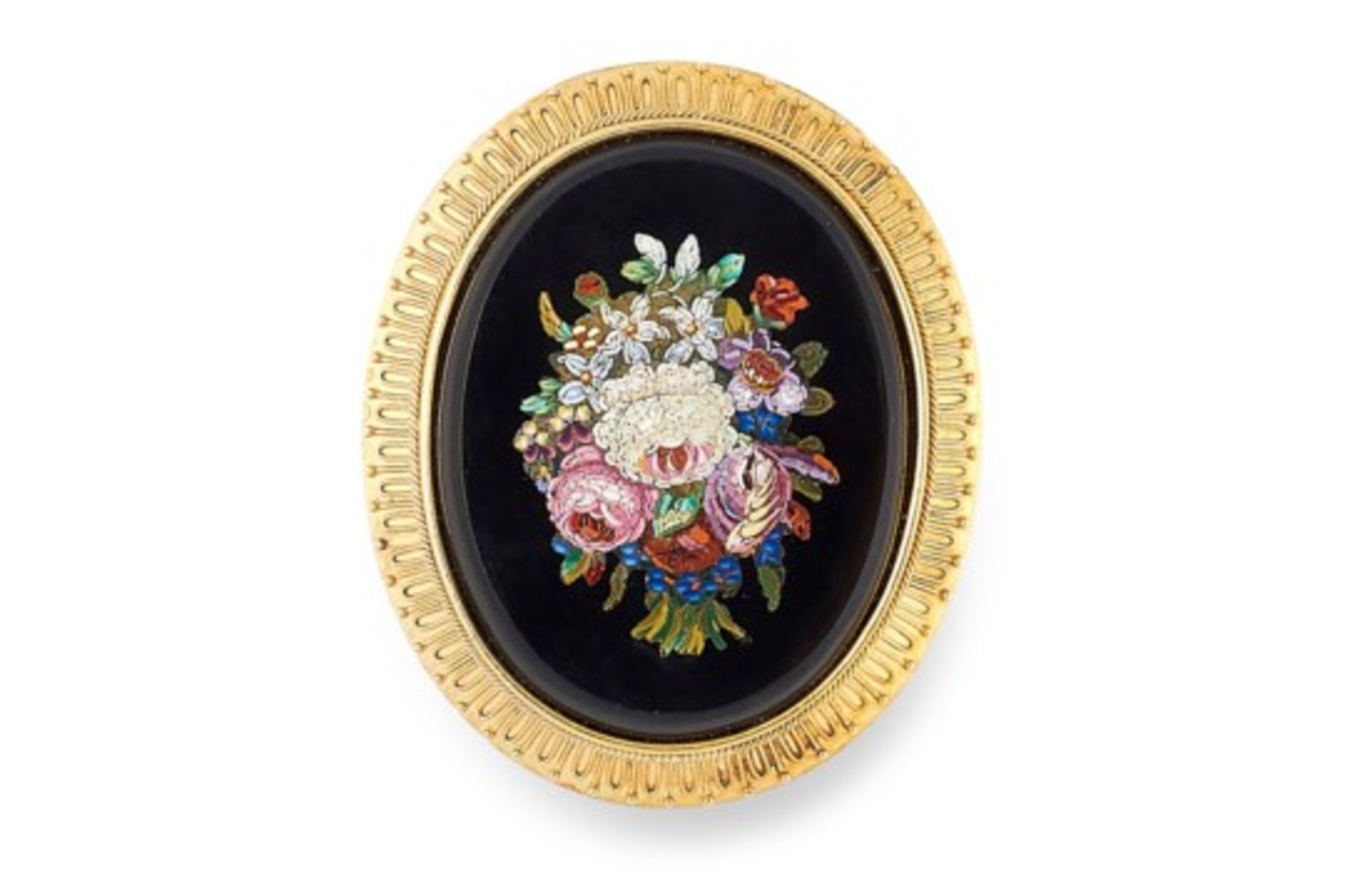 AN ANTIQUE MICROMOSAIC BROOCH comprising of an oval polished onyx face set with a micromosaic