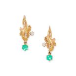 A PAIR OF ART NOUVEAU EMERALD AND DIAMOND EARRINGS in floral motif each set with an old cut