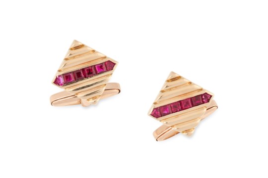 A PAIR OF RUBY CUFFLINKS, PAUL FLATO in 14ct yellow gold, in fluted square design, set with a