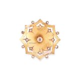 A DIAMOND AND PEARL BROOCH in floral design, set with a central round old cut diamond of 0.40 carats