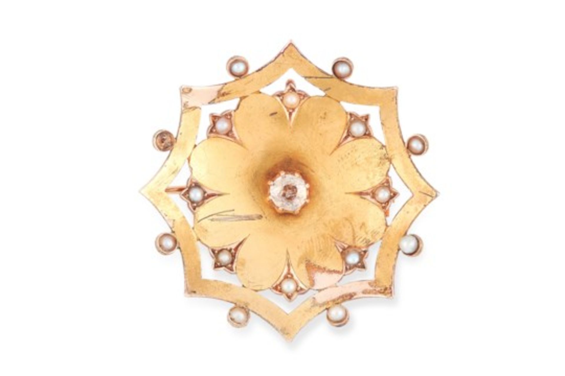 A DIAMOND AND PEARL BROOCH in floral design, set with a central round old cut diamond of 0.40 carats