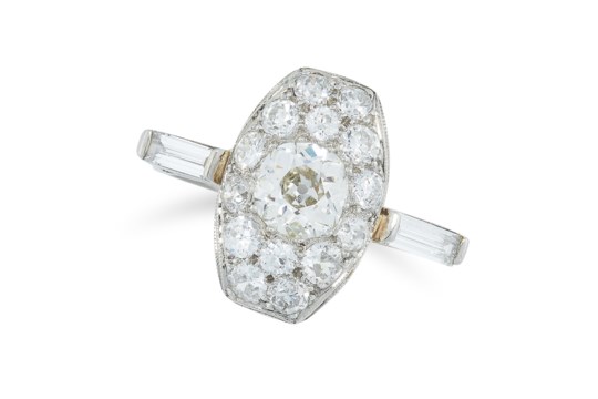 A DIAMOND DRESS RING the oval face set with round old cut diamonds totalling 2.2-2.6 carats, between