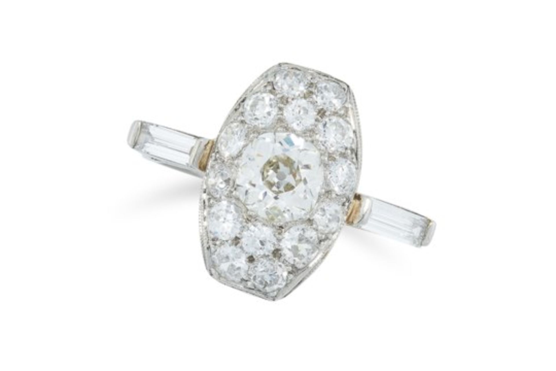 A DIAMOND DRESS RING the oval face set with round old cut diamonds totalling 2.2-2.6 carats, between