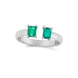 A COLOMBIAN EMERALD RING in 18ct white gold, set with two emerald cut emeralds totalling 0.60