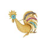 A VINTAGE RUBY, SAPPHIRE AND TURQUOISE COCKEREL BROOCH set with cabochon turquoise, round cut rubies