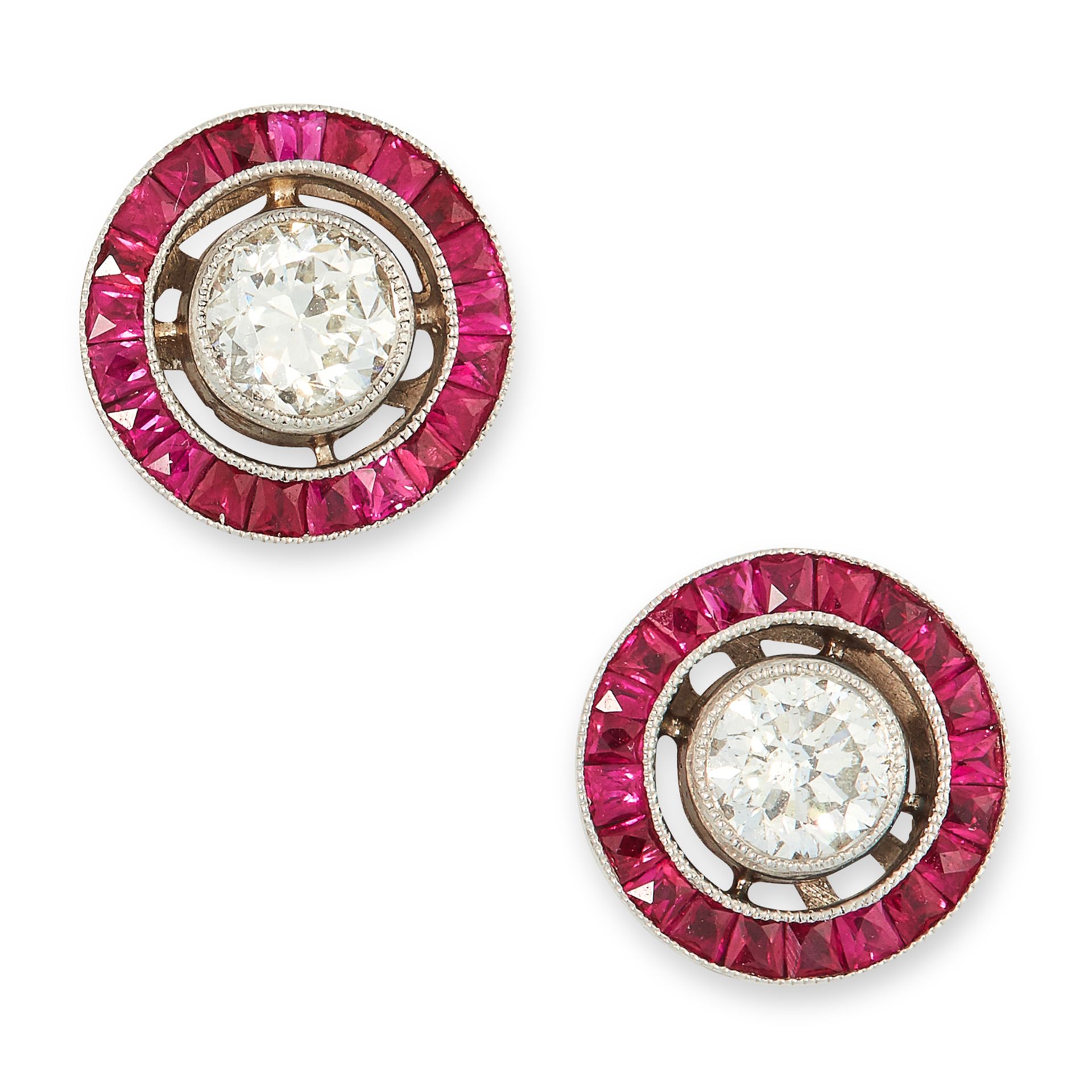 A PAIR OF DIAMOND AND RUBY TARGET EARRINGS each set with a round cut diamond within a border of