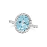 AN AQUAMARINE AND DIAMOND CLUSTER RING in 18ct white gold, set with an oval cut aquamarine in a