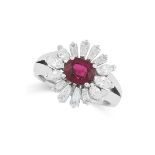 A RUBY AND DIAMOND CLUSTER RING set with an oval cut ruby of 1.46 carats in a border of tapered