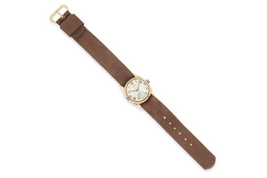 A LADIES WRISTWATCH, ROLEX with a gold bezel and brown fabric strap, 22.5cm, 22.7g.