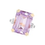 AN AMETHYST AND DIAMOND DRESS RING in 18ct yellow gold, set with an emerald cut amethyst between