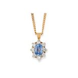 SAPPHIRE AND DIAMOND CLUSTER PENDANT set with an oval cut sapphire and round cut diamonds, 1cm, 4.