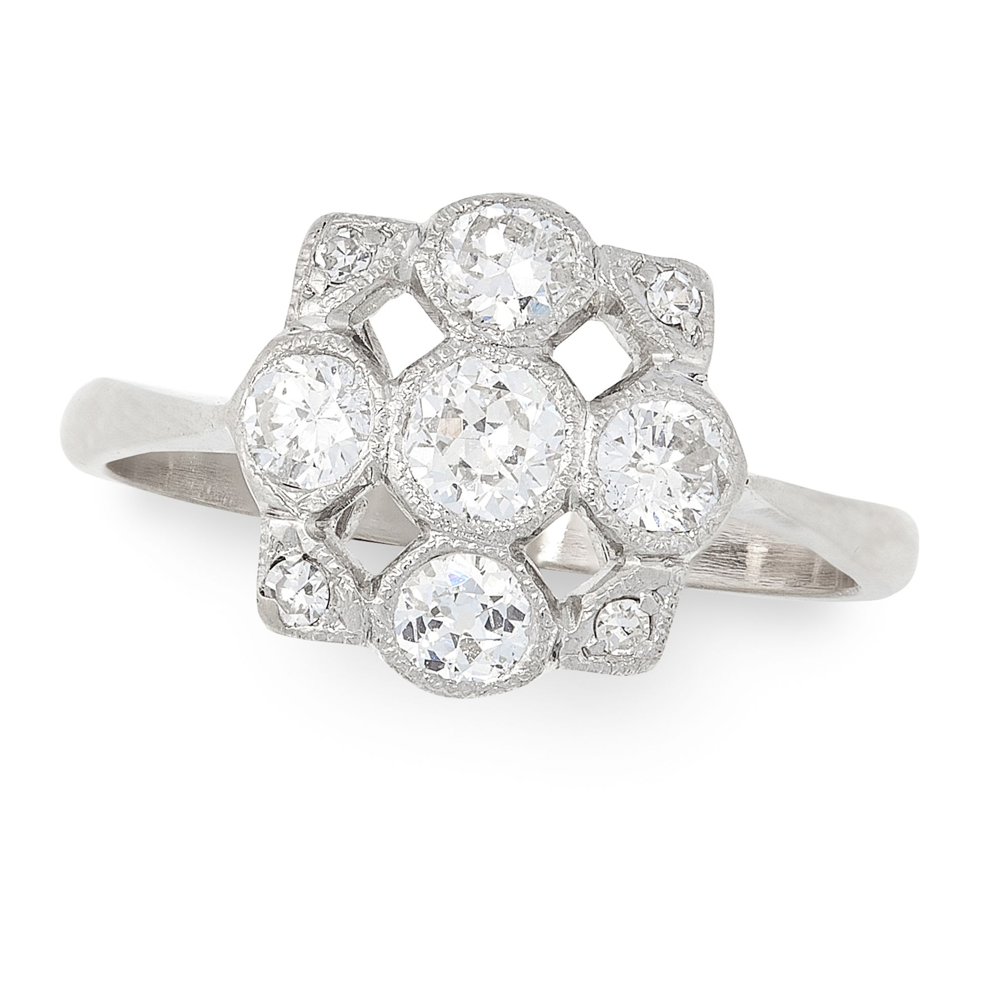A DIAMOND DRESS RING in white gold, the openwork face set with a cluster of five old and round cut