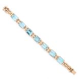 A VINTAGE AQUAMARINE BRACELET in yellow gold, set with seven emerald cut aquamarines totalling 42.