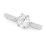 A SOLITAIRE DIAMOND DRESS RING in platinum, set with an old round cut diamond of 1.06 carats, full