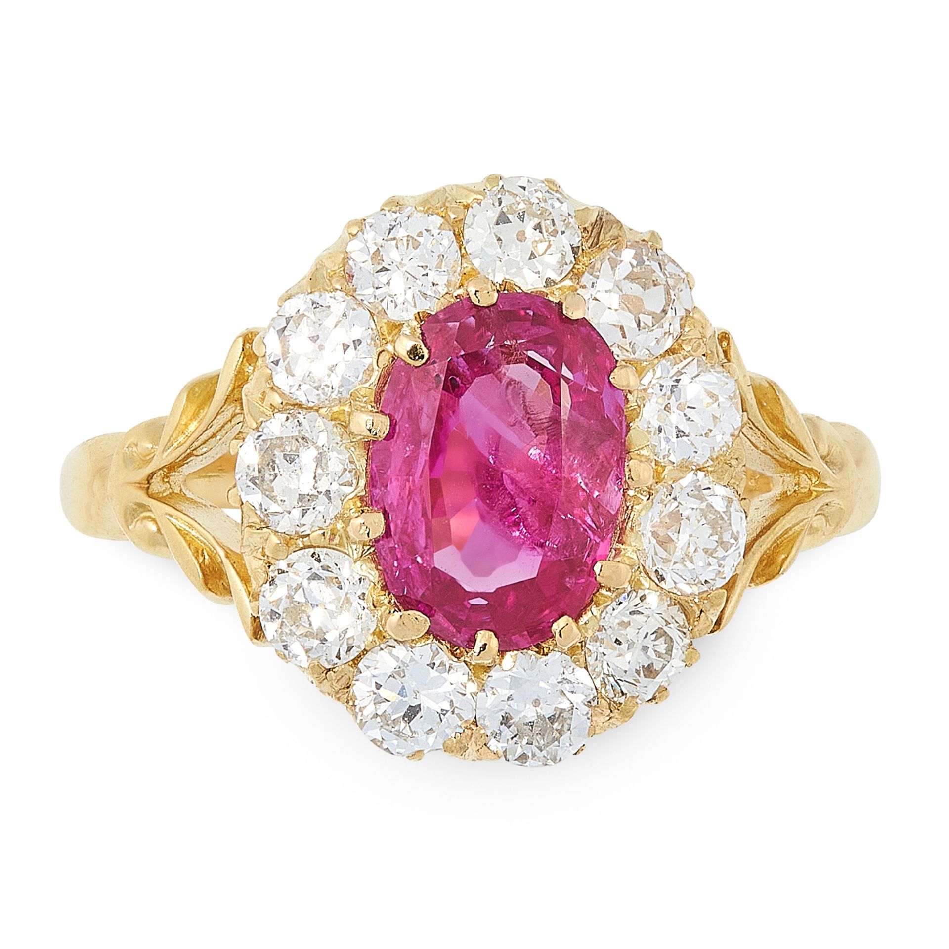 AN ANTIQUE BURMA NO HEAT RUBY AND DIAMOND RING in 18ct yellow gold, set with an oval cut ruby of 1.