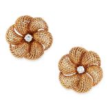 A PAIR OF VINTAGE DIAMOND CLIP EARRINGS, STERLE in 18ct yellow gold, each designed as a flower set